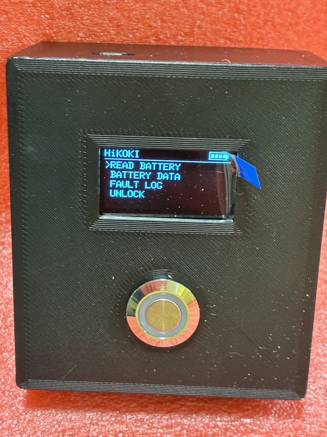 HiKOKI standalone diagnostic tool with OLED battery menu